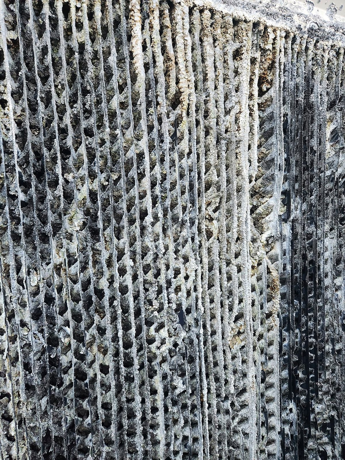 Mineral scale on cooling tower fill