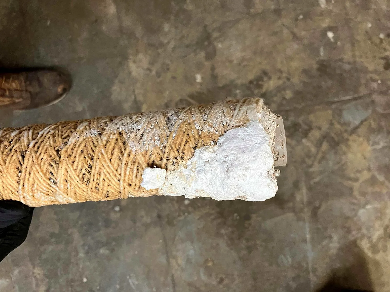 Cartridge filter coated in scale ahead of an RO system