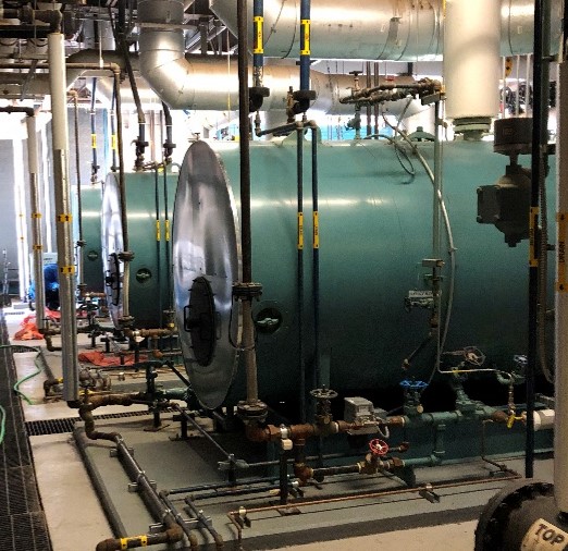 Industrial steam boiler and treatment piping