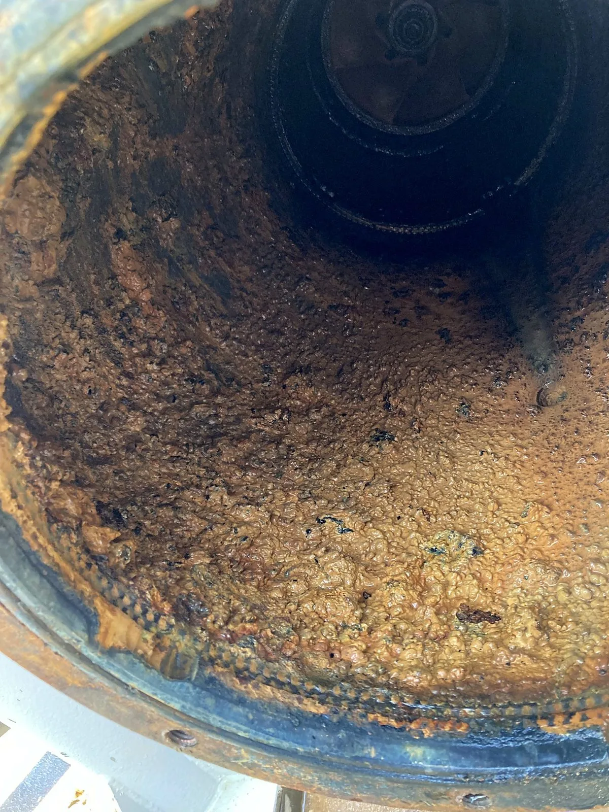 Rust and sludge inside closed loop piping